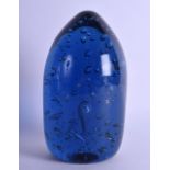 AN UNUSUAL VICTORIAN BLUE DUMP GLASS DOOR STOP. 21 cm high.