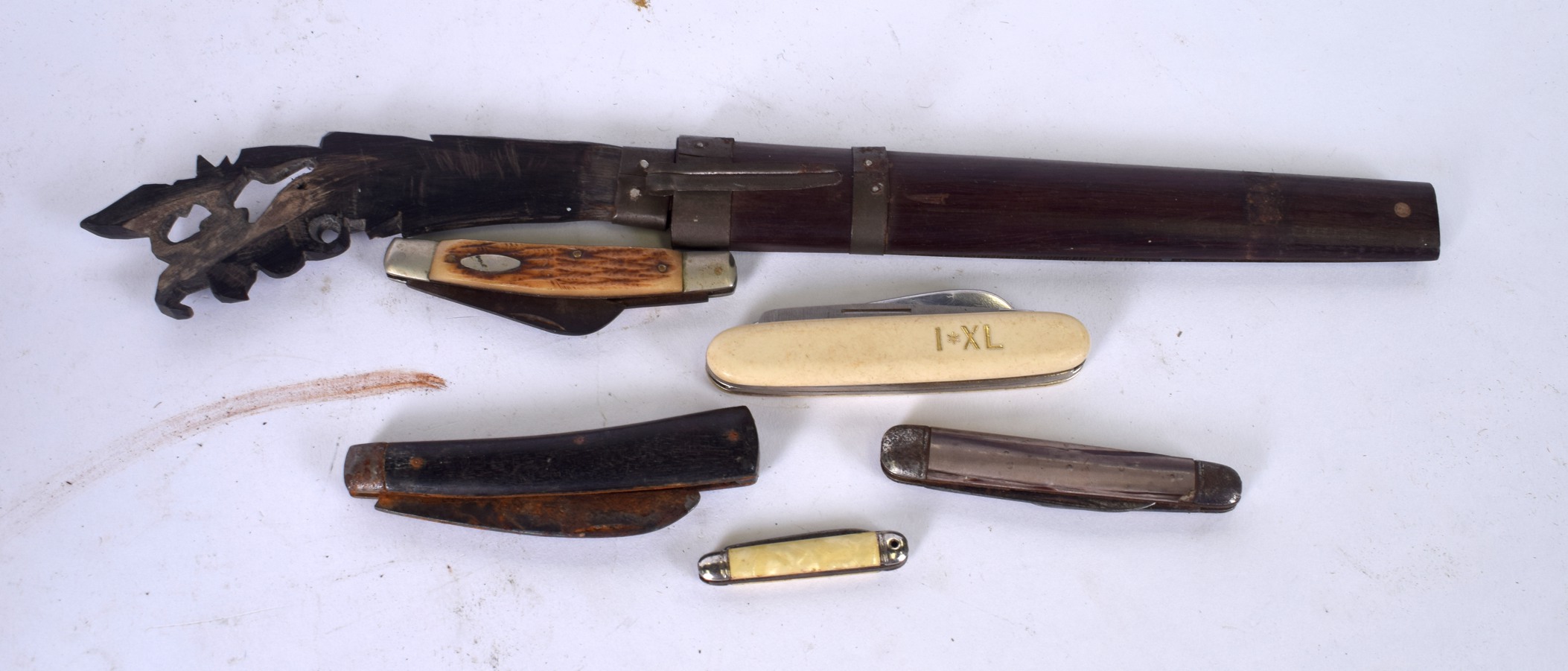 A SMALL GROUP OF FRUIT KNIVES, together with a dagger. (qty)