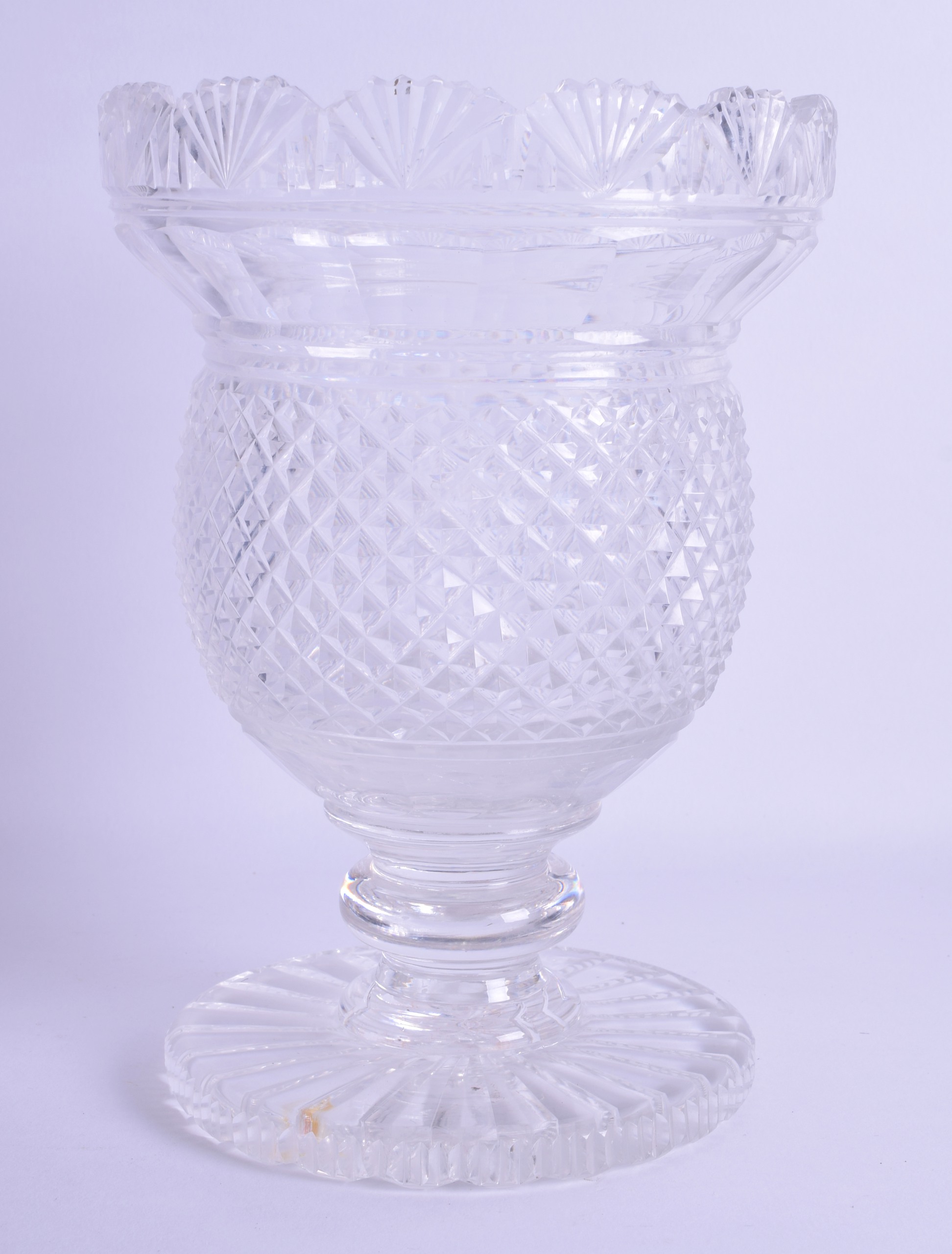 AN EARLY 19TH CENTURY IRISH CUT GLASS PEDESTAL VASE with foliate fan shaped rim. 20 cm x 15 cm.