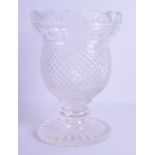 AN EARLY 19TH CENTURY IRISH CUT GLASS PEDESTAL VASE with foliate fan shaped rim. 20 cm x 15 cm.