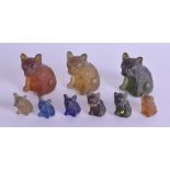 A SET OF NINE EARLY 20TH CENTURY GLASS FIGURES OF DOGS modelled in various stances. Largest 4 cm