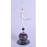 A STYLISH HUNGARIAN GLASS FIGURE BY ISTVAN KOMAROMY modelled as a dancing female. 18 cm high.