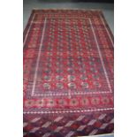 EARLY 20TH CENTURY TEKKE TURKMEN LONG RUG, decorated with motifs. 291 cm x 186 cm.