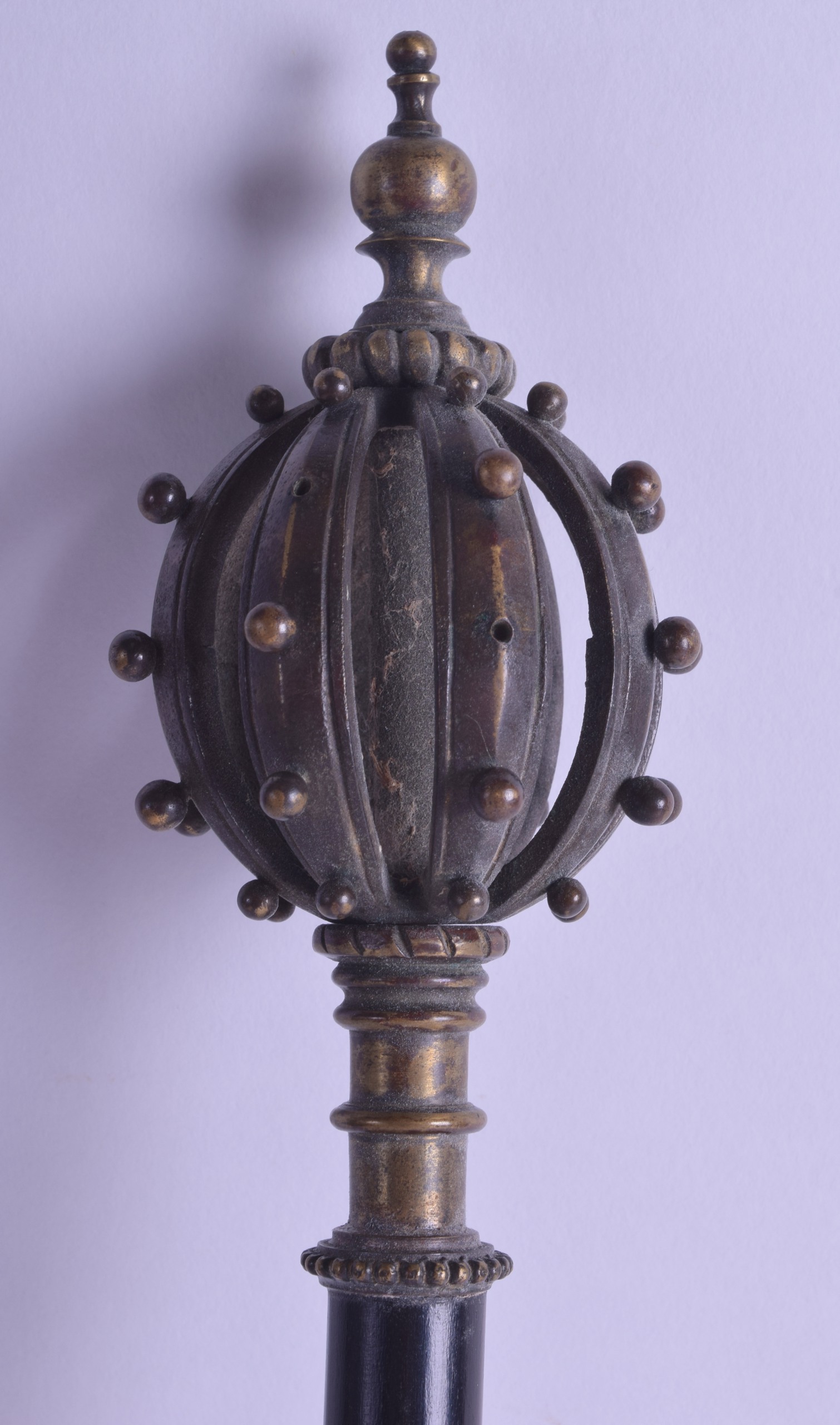 A 19TH CENTURY EUROPEAN BRONZE AND EBONY MACE with open work crown like finial. 46 cm long. - Image 2 of 3