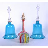 A STYLISH GLASS PAPERWEIGHT, together with an overlaid bottleneck vase and a pair of blue glass