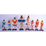 A SET OF EIGHT MURANO GLASS CLOWNS in various forms and sizes. Largest 31 cm high. (8)