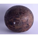 A RARE 19TH CENTURY AMERICAN CIVIL WAR 'PRACTISE ROUND' WOOD CANNONBALL. 24 cm x 24 cm.