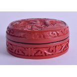 AN EARLY 20TH CENTURY CHINESE CARVED CINNABAR LACQUER ROUGE BOX AND COVER decorated with figures