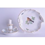 A GERMAN MEISSEN LEAF SHAPED PORCELAIN DISH together with a Meissen chamberstick. 18 cm & 12 cm