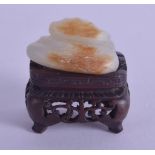 A SMALL 18TH/19TH CENTURY CHINESE CARVED GREENISH WHITE JADE LINGZHI FUNGUS Qianlong/Jiaqing, of