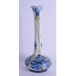 A STYLISH MOORCROFT MACINTYRE FLORIAN WARE TUBE LINED VASE painted with stylised floral sprays. 20