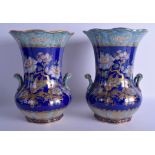 A PAIR OF LOSOL WARE KEELING & CO TWIN HANDLED LUSTRE VASES decorated with birds and foliage. 28