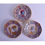 A SET OF THREE 19TH CENTURY HISPANO MORESQUE TYPE LUSTRE DISHES painted with portraits and