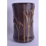 A RARE 19TH CENTURY CHINESE CARVED WOOD BRUSH POT Bitong, overlaid with bronze foliage and bamboo.