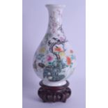 A LATE 19TH CENTURY CHINESE FAMILLE ROSE PORCELAIN VASE Guangxu, bearing Qianlong marks to base,