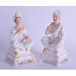 A PAIR OF 19TH CENTURY FRENCH PAIRS PORCELAIN FIGURES OF TURKS modelled seated upon square form