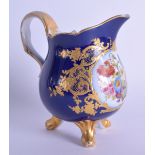 Early 19th c. Paris porcelain fine three footed jug with raised gilding blue ground painted with