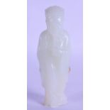 A CHINESE CARVED PALE GREENISH WHITE JADE FIGURE OF A SCHOLAR modelled wearing robes. 8.25 cm high.