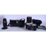 A VINTAGE CHINON CAMERA, together with a Sigma Ultra Lens, Chinon Lens and associated cases and a