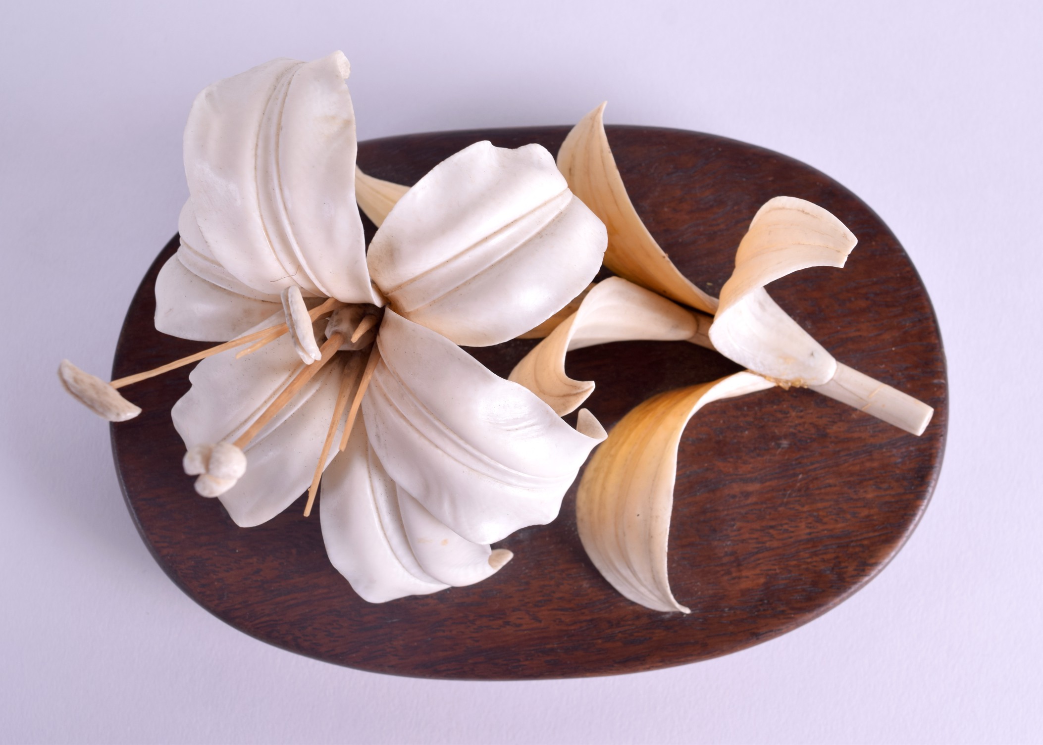 A 19TH CENTURY JAPANESE MEIJI PERIOD POLYCHROMED IVORY OKIMONO modelled as a naturalistic floral - Image 3 of 3
