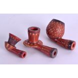 A SET OF THREE MIDDLE EASTERN TURKISH CLAY PIPES gold inlaid with various motifs. Largest 10 cm