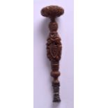 AN EARLY 19TH CENTURY CONTINENTAL CARVED COQUILLA NUT SEAL decorated with fruiting vines and