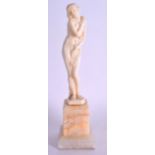 A FINE ART NOUVEAU CARVED IVORY FIGURE OF A NUDE FEMALE by Joe Descomps, elegantly carved holding