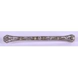 AN ANTIQUE WHITE GOLD AND DIAMOND BAR BROOCH. 4.6 grams. 6 cm long.