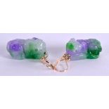 A PAIR OF CHINESE GOLD AND LAVENDER JADEITE EARRINGS formed as buddhistic lions. 2.75 cm wide.