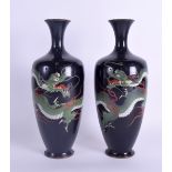 A PAIR OF LATE 19TH CENTURY JAPANESE MEIJI PERIOD GINBARI CLOISONNE ENAMEL VASES decorated with