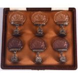 A LOVELY BOX SET OF EARLY 20TH CENTURY AUSTRIAN SILVER AND INTAGLIO GLASS MENU HOLDERS decorated