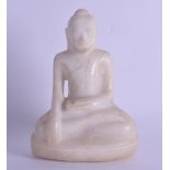 A 19TH CENTURY INDIAN CARVED WHITE MARBLE FIGURE OF A SEATED BUDDHA modelled upon a triangular base.