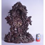 A LARGE 19TH CENTURY BAVARIAN BLACK FOREST FUSEE BRACKET CUCKOO CLOCK formed with a fox over looking