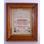 A 19TH CENTURY FRAMED EMBROIDERED SAMPLER by Emily Ratchett July 21st 1885. Image 17 cm x 22 cm.