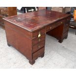 A 19TH CENTURY MAHOGANY PARTNERS DESK, moulded top inset with gilt tooled red leather above an