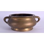 A GOOD 18TH/19TH CENTURY TWIN HANDLED BRONZE CENSER bearing Xuande marks to base, of plain form with