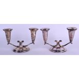 A STYLISH PAIR OF SILVER CANDLESTICKS. Birmingham 1962. 17 cm wide.