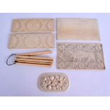 A GROUP OF FOUR 19TH CENTURY EUROPEAN CARVED IVORY PLAQUES together with a smaller plaque & a set of