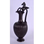 A 19TH CENTURY ITALIAN BRONZE GRAND TOUR EWER formed with a winged horse clambering to the spout. 26