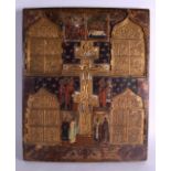 A RARE 18TH CENTURY RUSSIAN PAINTED WOODEN ICON unusually set with five brass and enamel plaques,