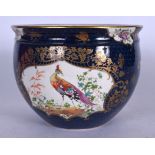 A WORCESTER STYLE BLUE SCALE JARDINIERE, decorated with panels of exotic birds, probably Boothes. 21