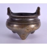 AN 18TH/19TH CENTURY CHINESE TWIN HANDLED BRONZE CENSER bearing Xuande marks to base, with high loop