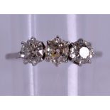 AN 18CT GOLD THREE STONE DIAMOND RING approx CT. Size P.