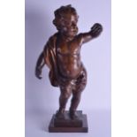 AN 18TH CENTURY NORTHERN EUROPEAN CARVED OAK FIGURE OF A PUTTI modelled holding an arm aloft upon