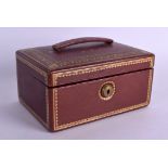 A GOOD VICTORIAN RED LEATHER GILT TOOLED JEWELLERY BOX decorated with scrolling motifs. 18 cm x 13.5