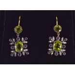 A PAIR OF 9 CT GOLD SILVER AMETHYST PERIDOT AND DIAMOND EARRINGS.