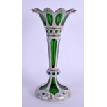 A LATE 19TH CENTURY BOHEMIAN GREEN AND WHITE OVERLAID GLASS VASE painted in gilt with foliage. 26 cm