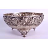 A LATE 19TH CENTURY CONTINENTAL EMBOSSED SILVER BOWL decorated with scrolling leaves. 12.8 oz. 20 cm