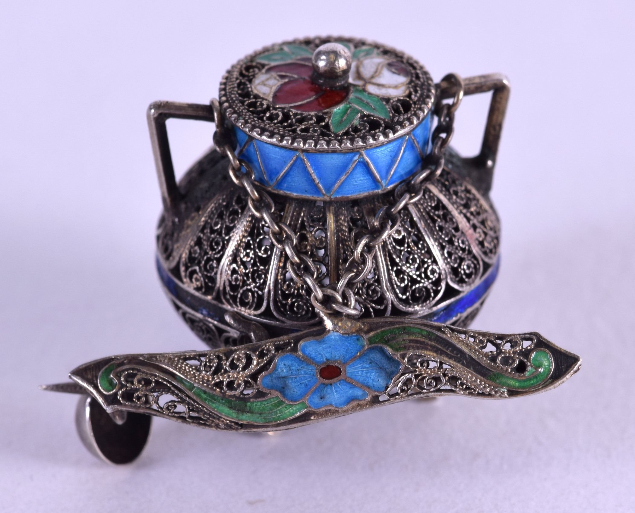 AN UNUSUAL EARLY 20TH CENTURY PORTUGUESE SILVER AND ENAMEL URN BROOCH.