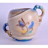 AN UNUSUAL CARLTON WARE TWIN HANDLED VASE painted with floral sprays under a blue rim. 13 cm high.